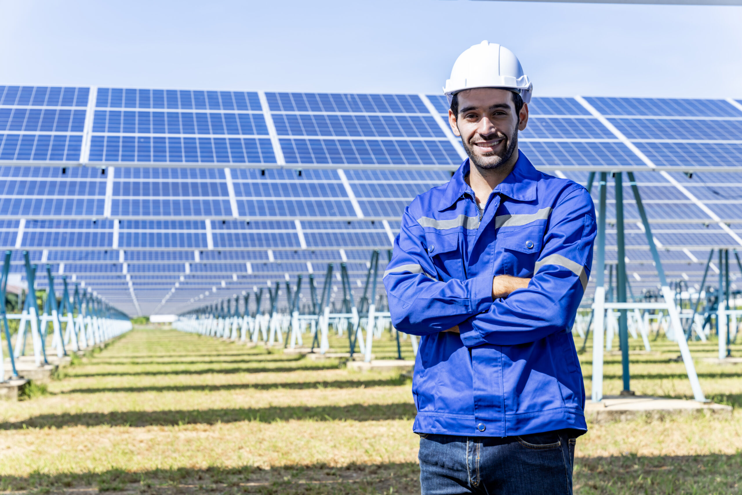 engineer smiles in solar farm field on sunny day 2026 03 24 09 12 39 utc scaled